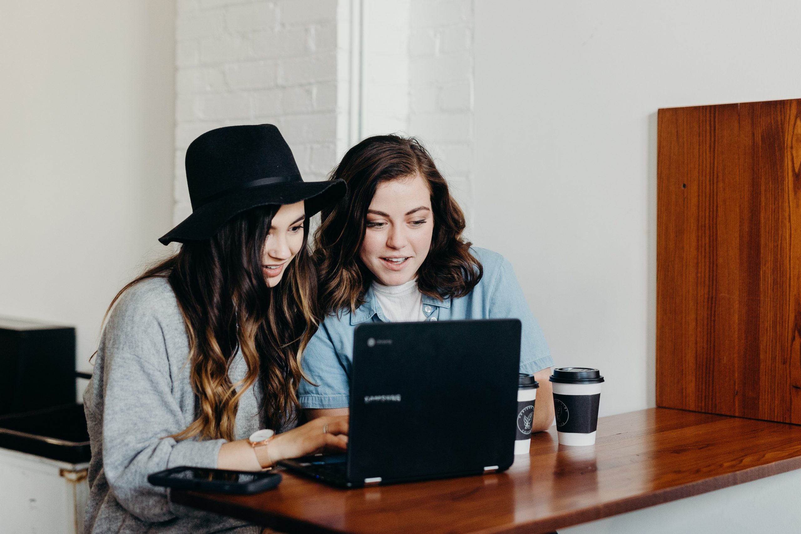 Girls on laptop Financial planning